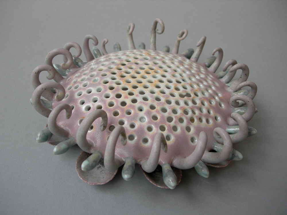 Chris Garofalo, Actinomma Sol, 2010, Glazed porcelain, 7&amp;nbsp;x 7&amp;nbsp;x 2.5 inches.